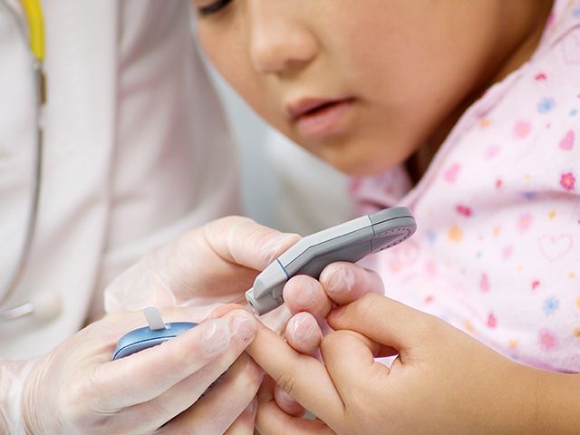 Child being seen by a doctor